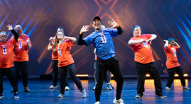 Dancers in bright costumes