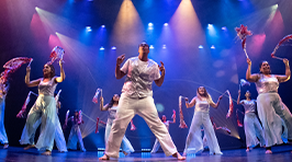 Dancers under blue lights